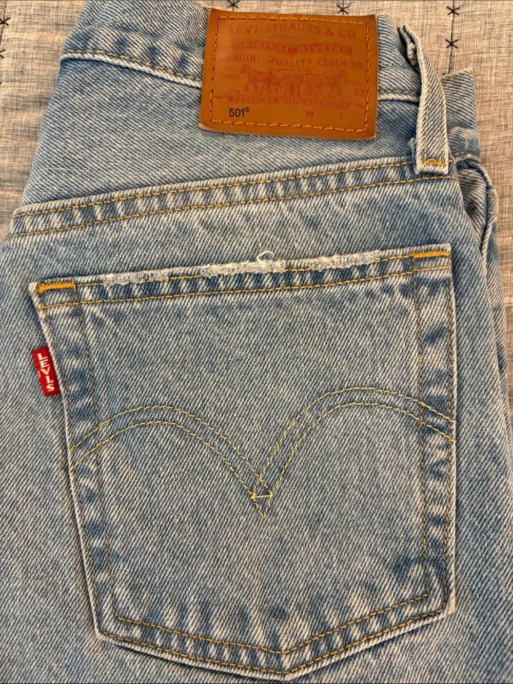 Levi's Light Blue Distressed Straight Leg Jeans